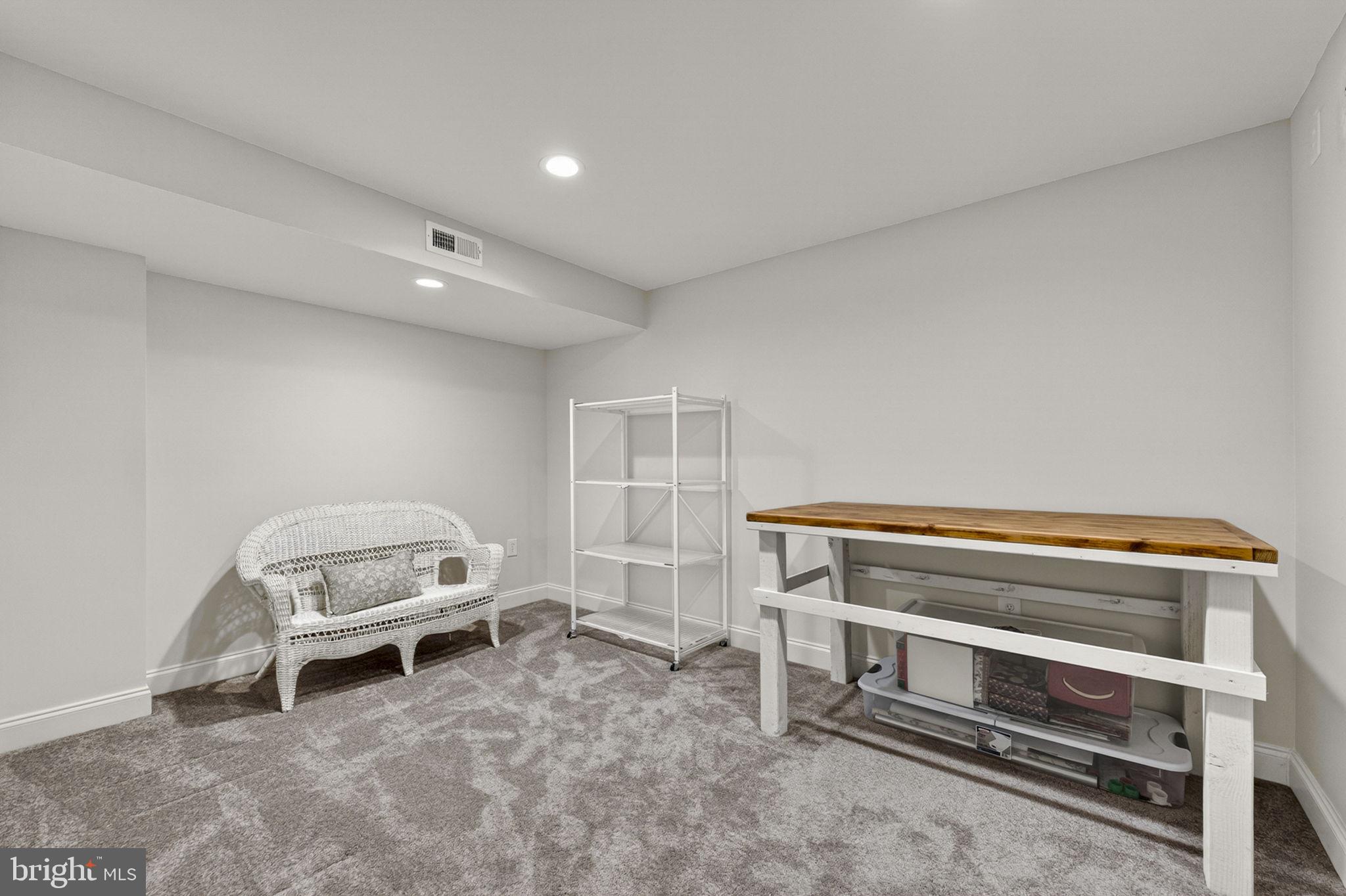 109 Tutelo Lane White Post, VA 22663 - Photo 37 of 54 a living room with a bed and a window