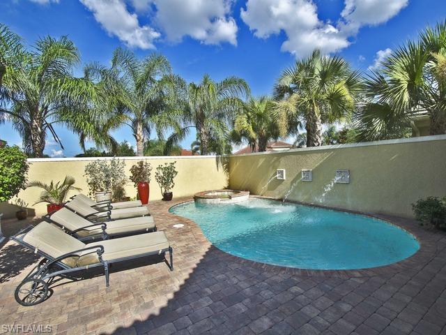 5030 Rustic Oaks Circle Naples, FL 34105 - Photo 2 of 12 a view of outdoor space swimming pool