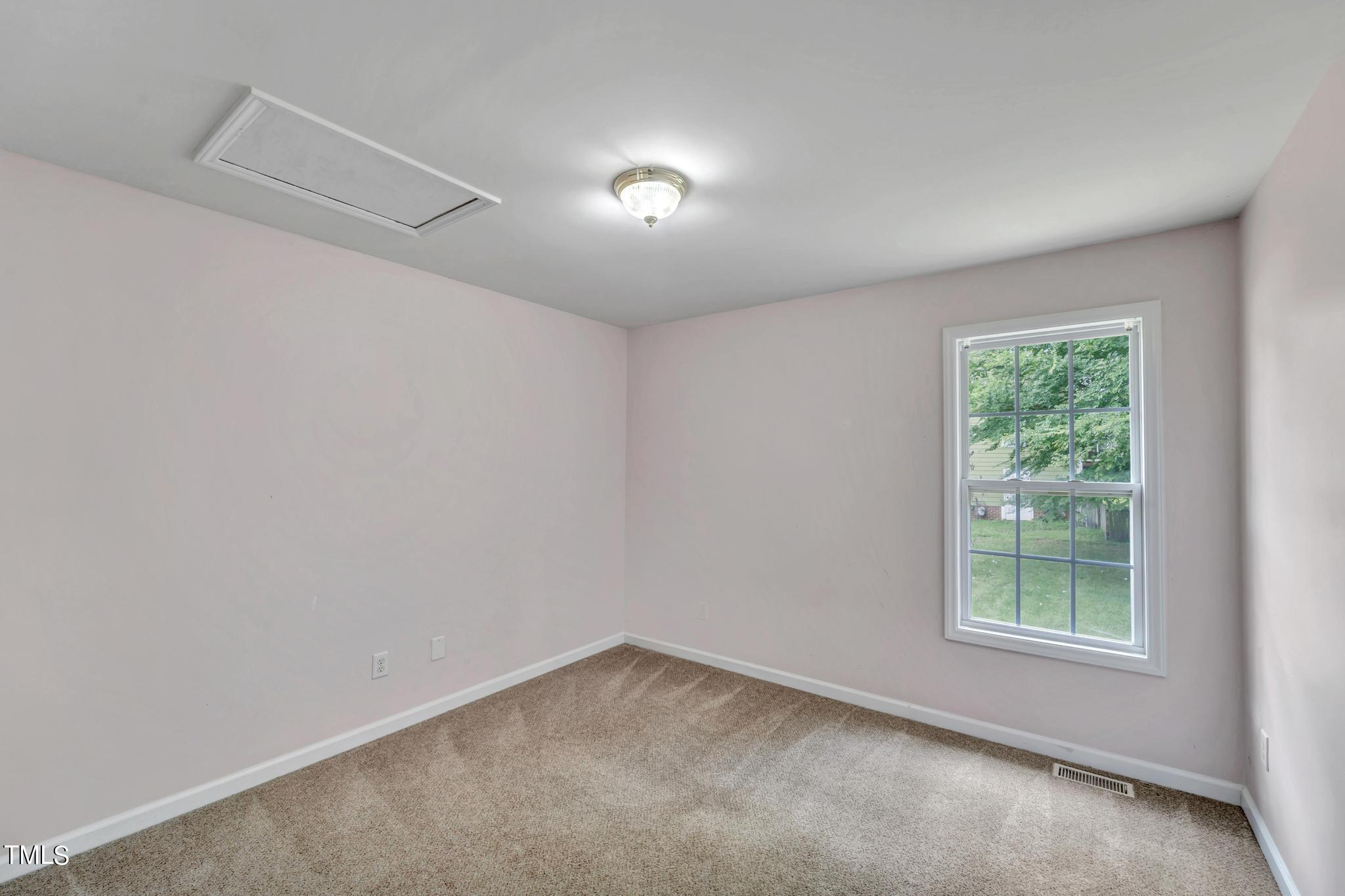 2505 Tryon Pines Drive Raleigh, NC 27603 - Photo 11 of 21 an empty room with windows