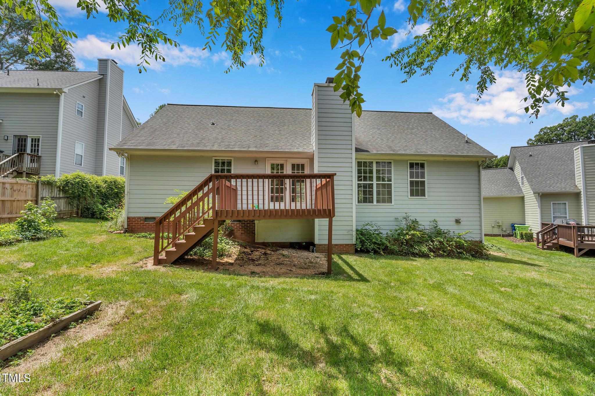 2505 Tryon Pines Drive Raleigh, NC 27603 - Photo 19 of 21 a house that is sitting in the grass
