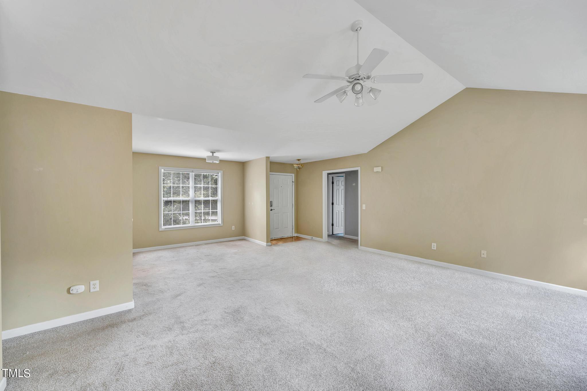 2505 Tryon Pines Drive Raleigh, NC 27603 - Photo 6 of 21 a view of an empty room with a window