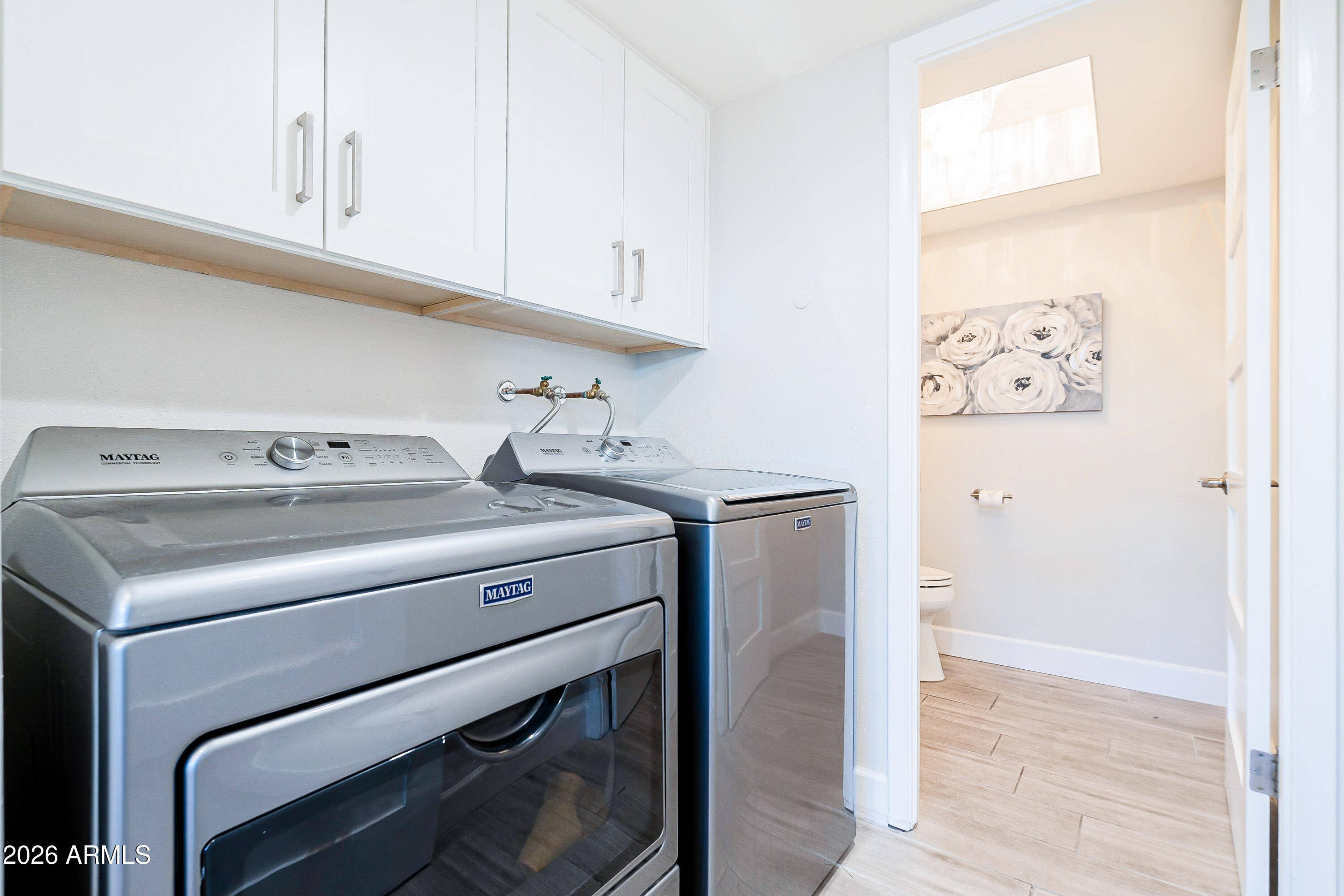 4243 North Miller Road Scottsdale, AZ 85251 - Photo 11 of 24 a utility room with dryer and washer