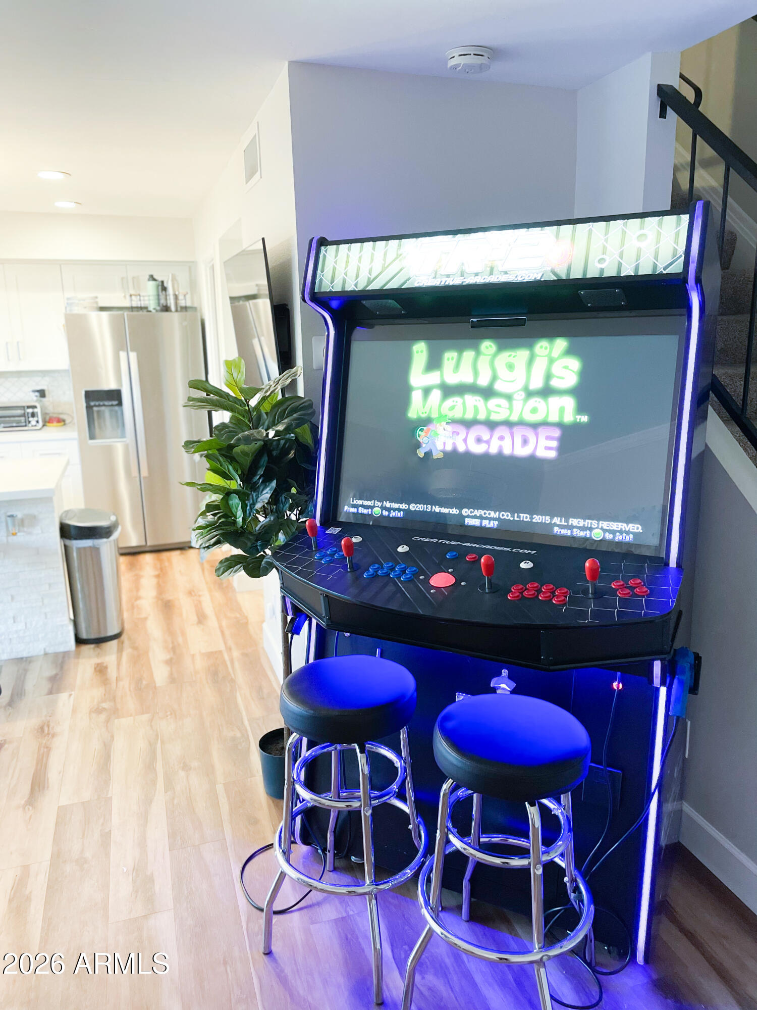 4243 North Miller Road Scottsdale, AZ 85251 - Photo 13 of 24 a view of a dining room with furniture window and wooden floor