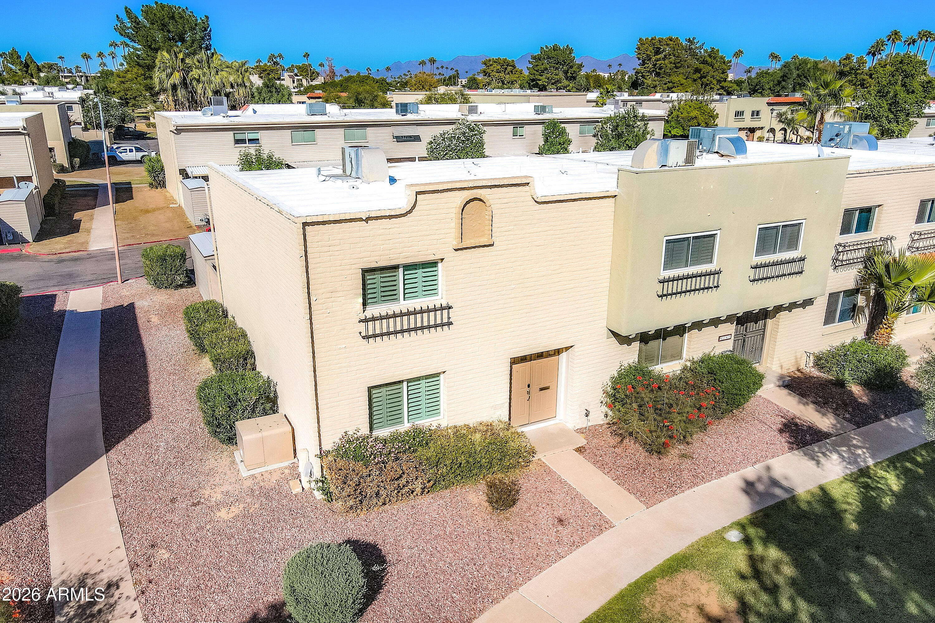 4243 North Miller Road Scottsdale, AZ 85251 - Photo 21 of 24 a view of residential houses with outdoor space