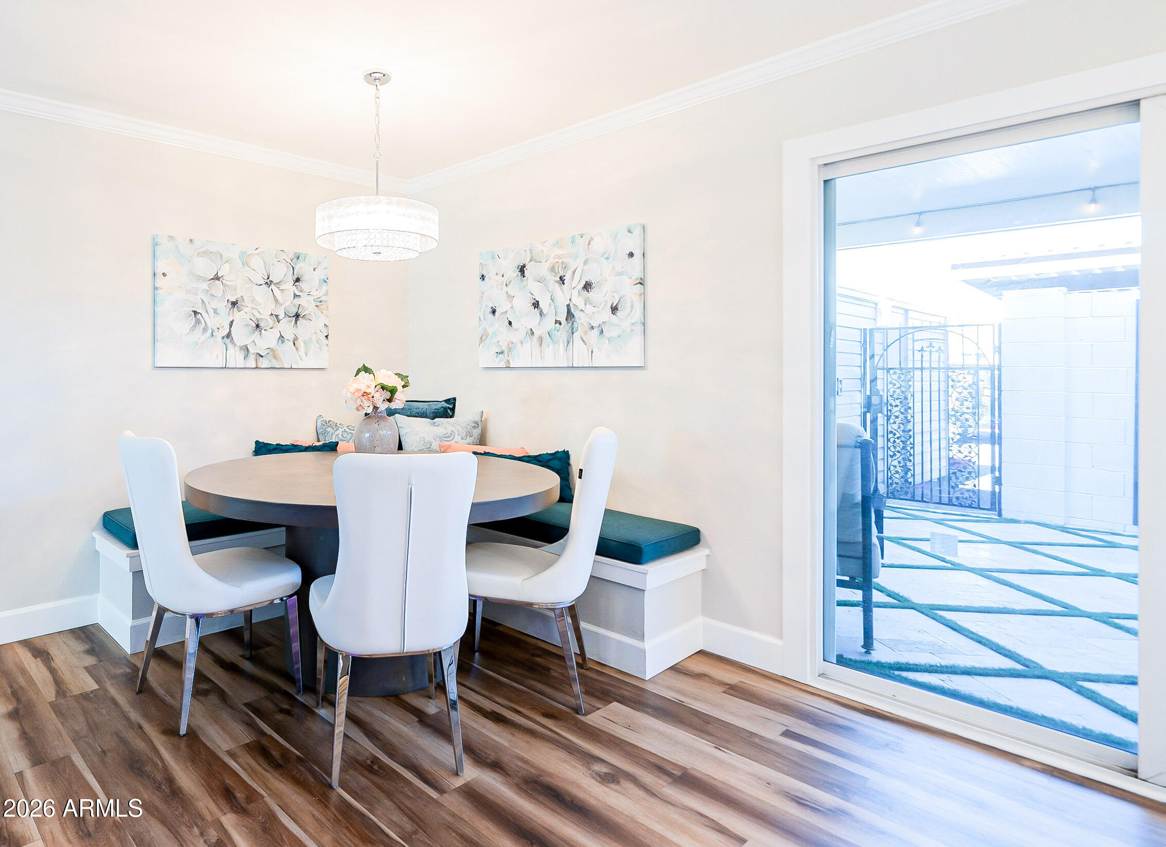 4243 North Miller Road Scottsdale, AZ 85251 - Photo 8 of 24 a table and chairs in a room