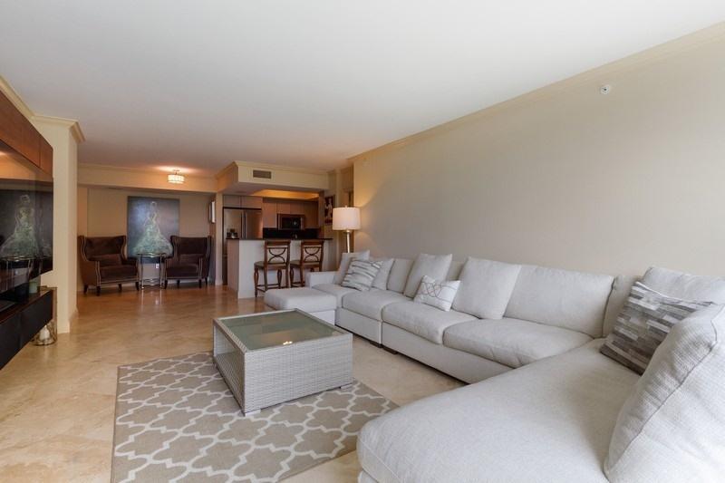 99 Southeast Mizner Boulevard, Unit 201 Boca Raton, FL 33432 - Photo 2 of 14 02_99SEMiznerBlvd201_10002_LivingRoom_Fl