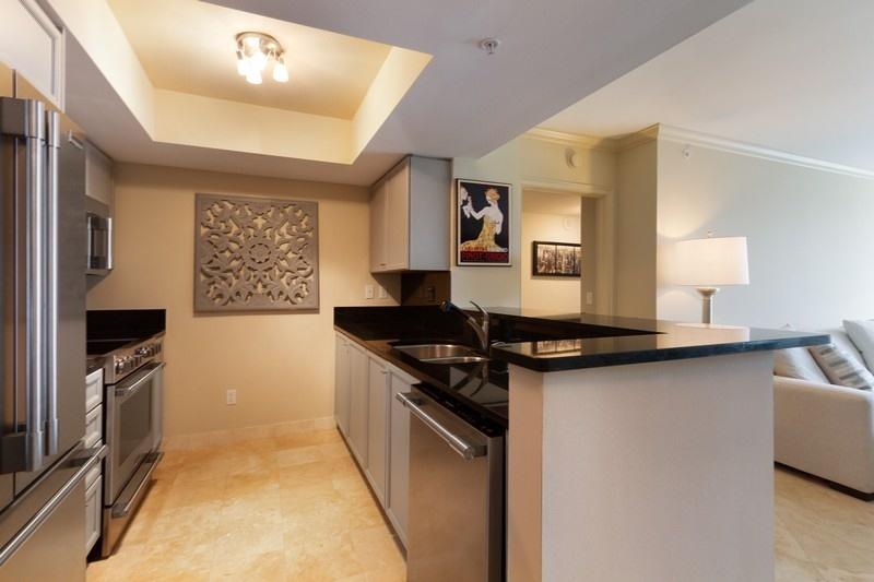 99 Southeast Mizner Boulevard, Unit 201 Boca Raton, FL 33432 - Photo 4 of 14 03_99SEMiznerBlvd201_177_Kitchen_FlexMLS