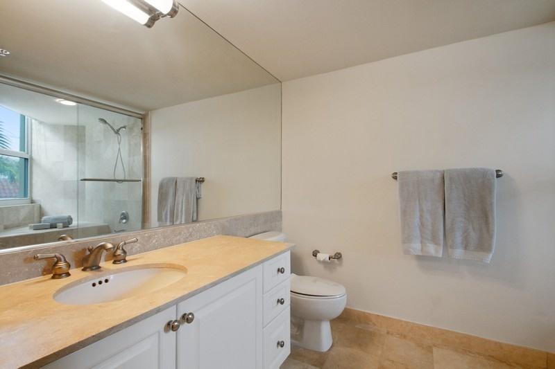 99 Southeast Mizner Boulevard, Unit 201 Boca Raton, FL 33432 - Photo 9 of 14 06_99SEMiznerBlvd201_13_MasterBathroom_F