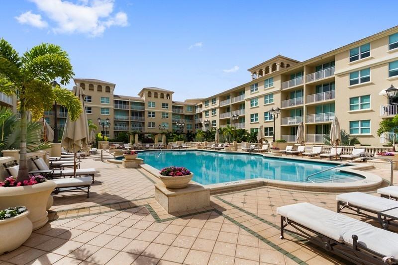 99 Southeast Mizner Boulevard, Unit 201 Boca Raton, FL 33432 - Photo 10 of 14 12_99SEMiznerBlvd201_29_Pool_FlexMLS800x