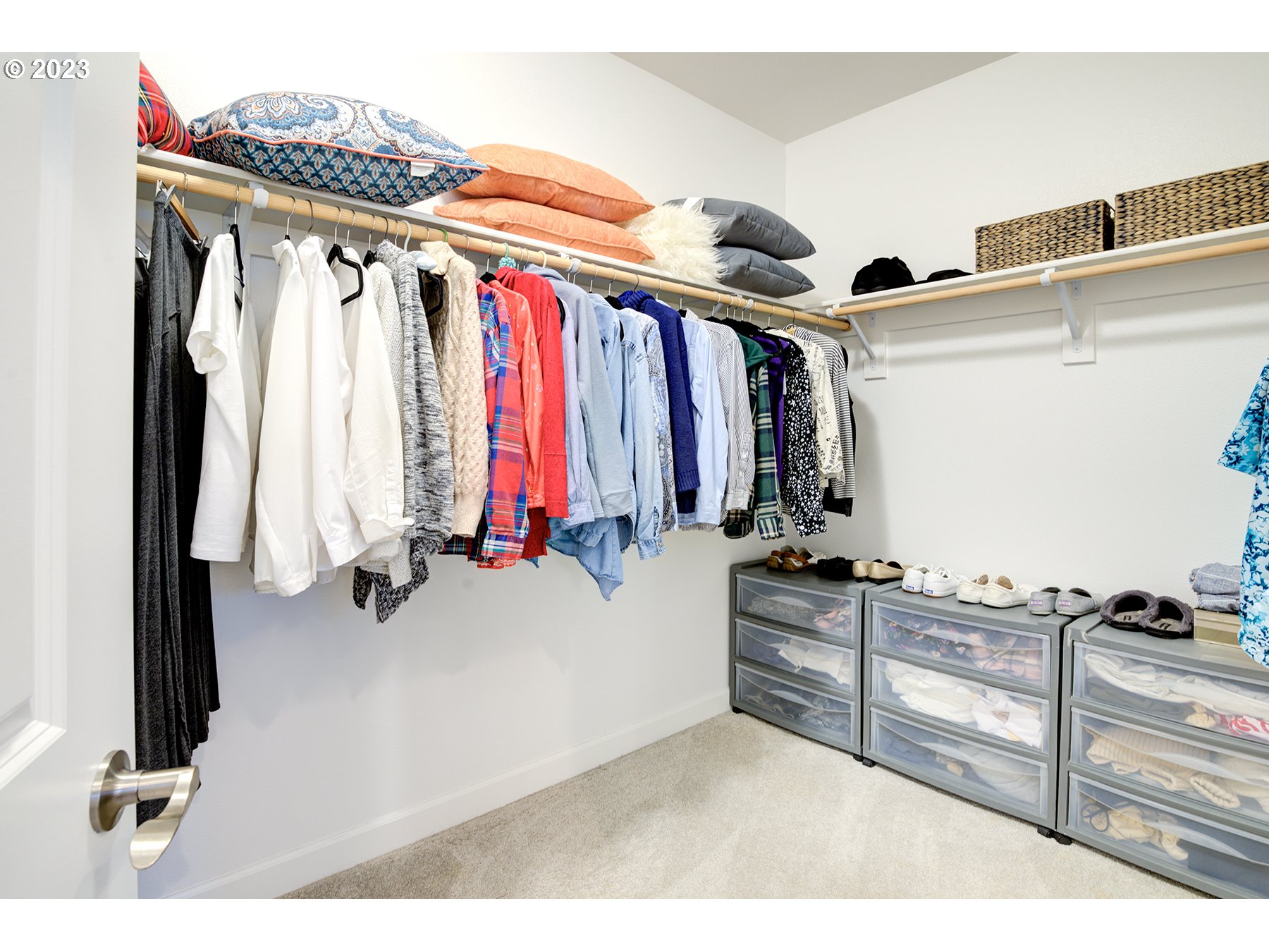 17402 Northeast 16th Avenue Ridgefield, WA 98642 - Photo 26 of 32 a view of walk in closet with clothes and shoes