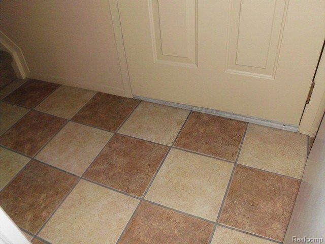 24608 Spring Lane, Unit 44 Harrison Township, MI 48045 - Photo 13 of 14 261-863453-Neutral Tile.JPG