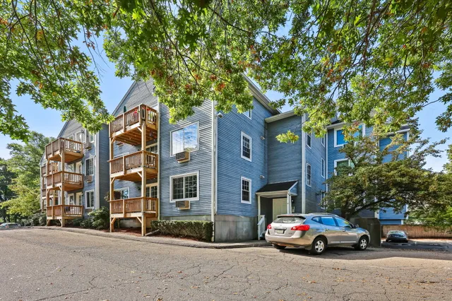 a car parked in front of a building
