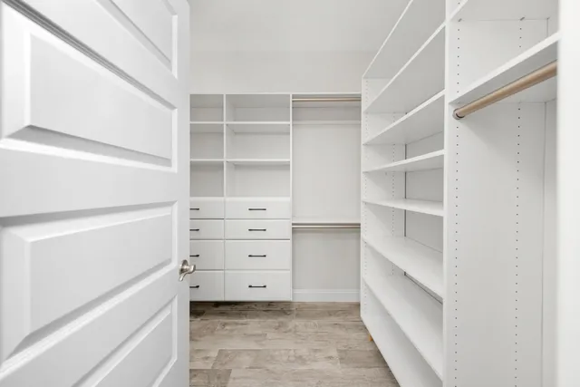 a view of an empty walk in closet