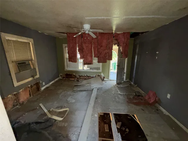 a room with gym equipment and a mirror