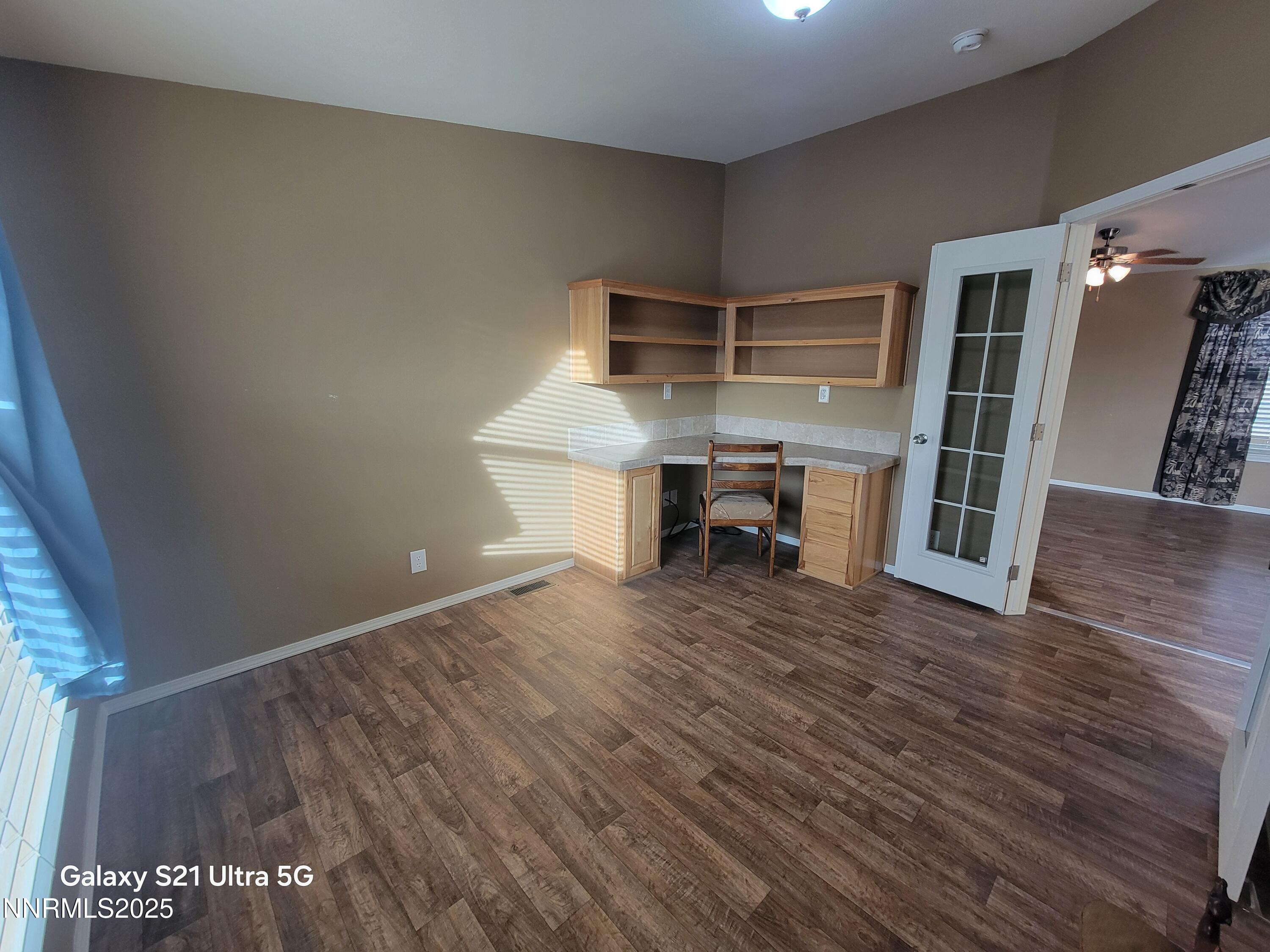 6650 Antelope Circle Austin, NV 89310 - Photo 10 of 25 a view of a livingroom with furniture and wooden floor
