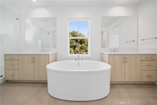 a living room with furniture and large window