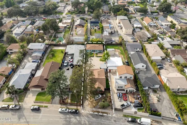 an aerial view of a city with houses