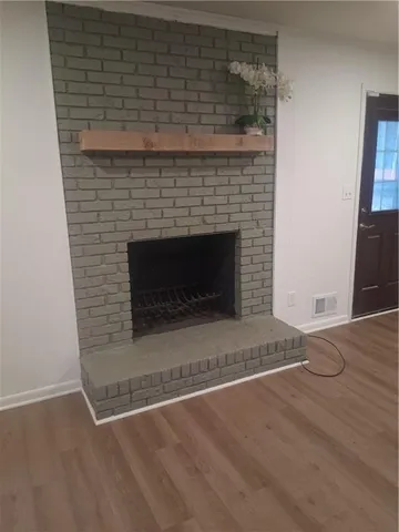 a living room with a fireplace