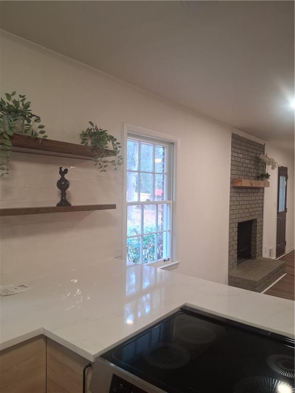 3425 New MacLand Road Powder Springs, GA 30127 - Photo 3 of 4 a kitchen with a window wooden floor and a sink