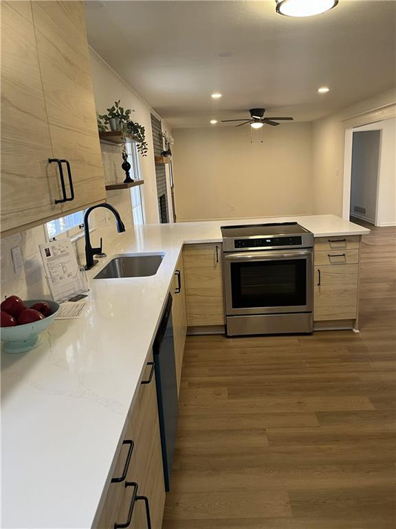 3425 New MacLand Road Powder Springs, GA 30127 - Photo 7 of 21 a kitchen with a sink and a stove top oven