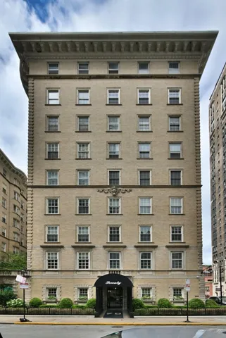 a front view of a building with streets