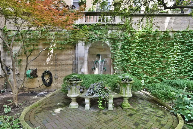 a view of street with flower plants