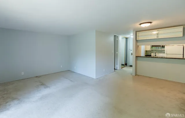 a view of a kitchen with a sink