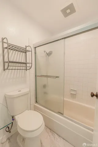 a view of balcony with wooden floor