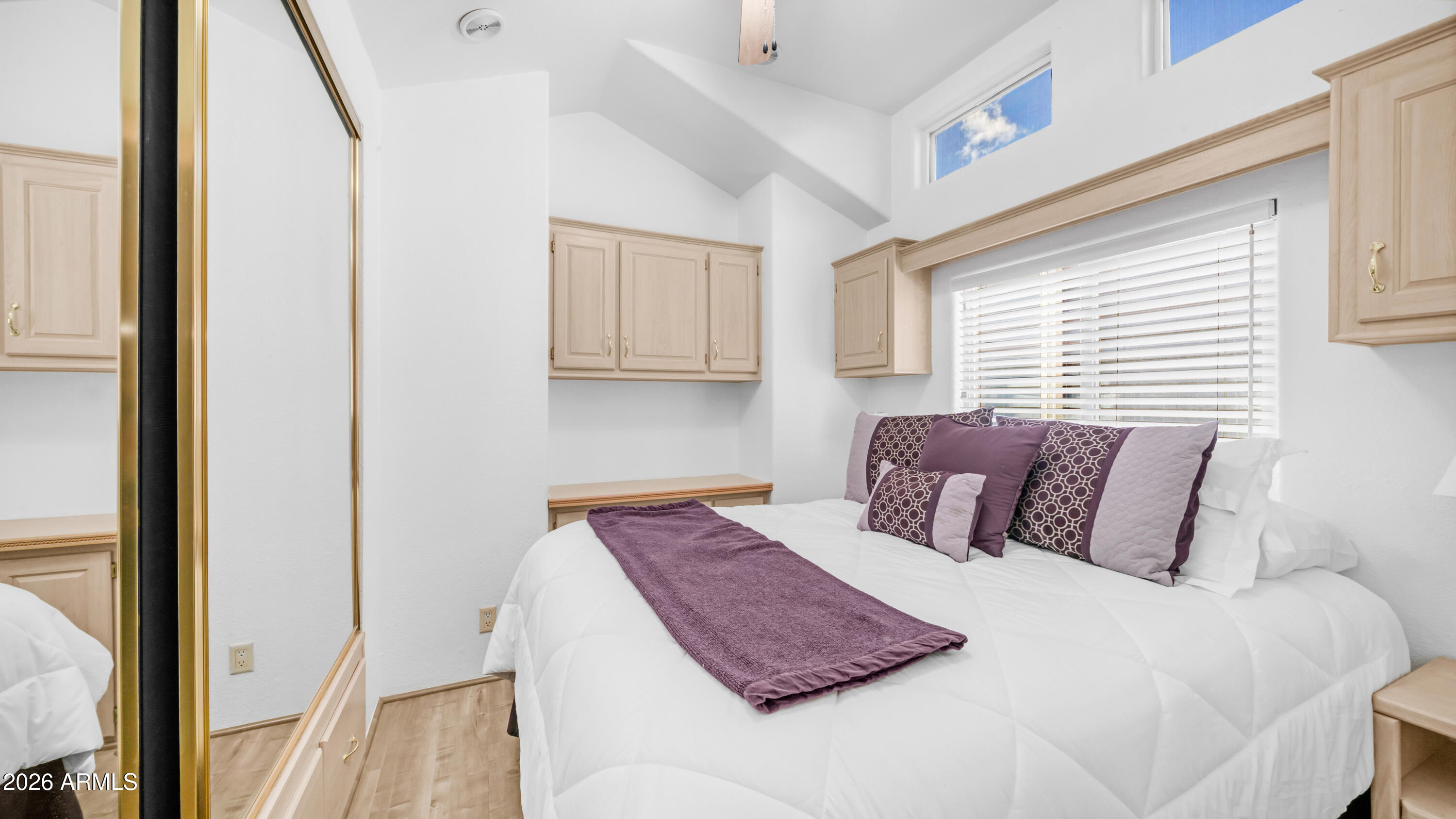 600 South Idaho Road Apache Junction, AZ 85119 - Photo 17 of 63 a bedroom with a bed and a window