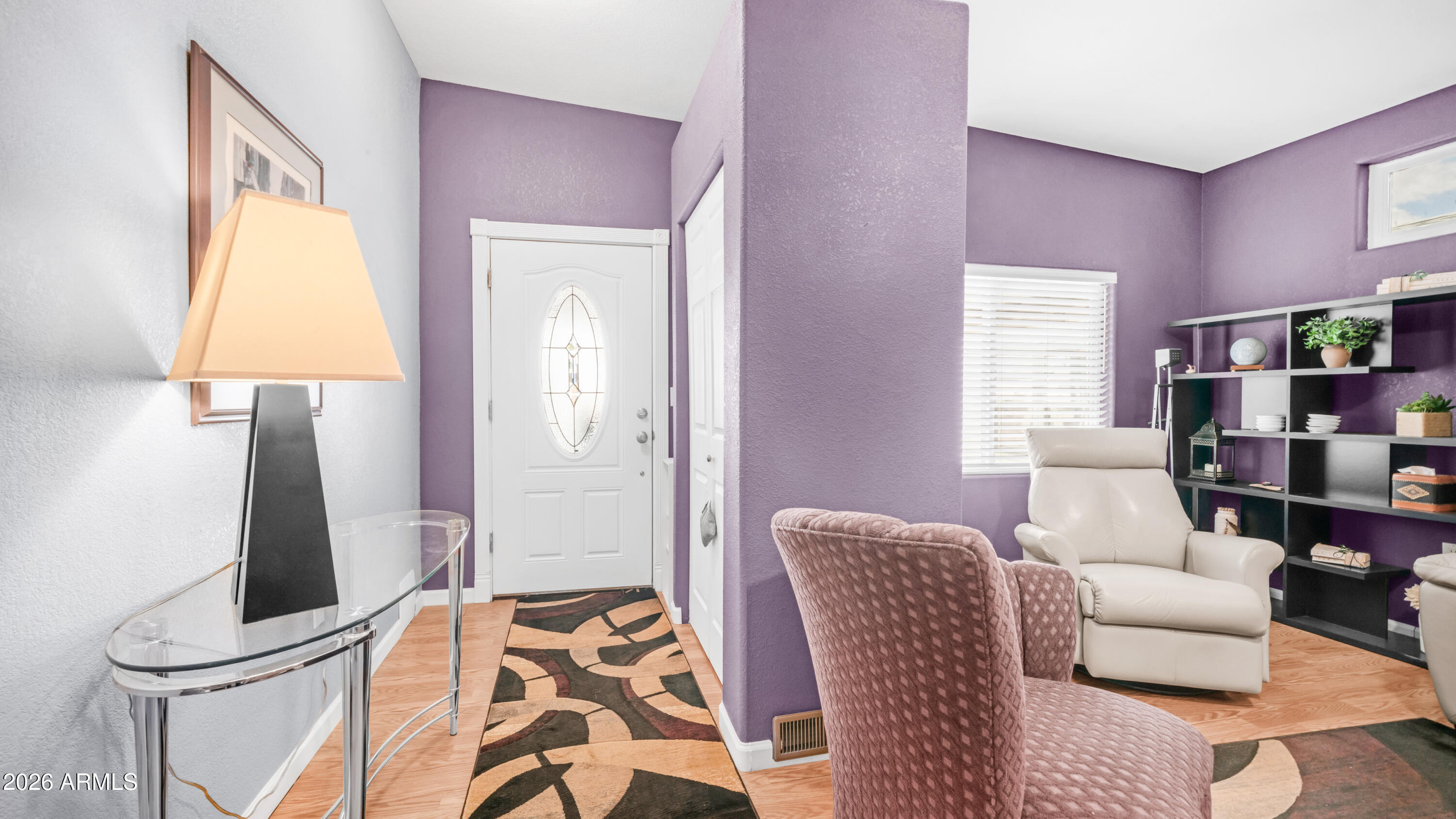 600 South Idaho Road Apache Junction, AZ 85119 - Photo 20 of 63 a living room with furniture and a window
