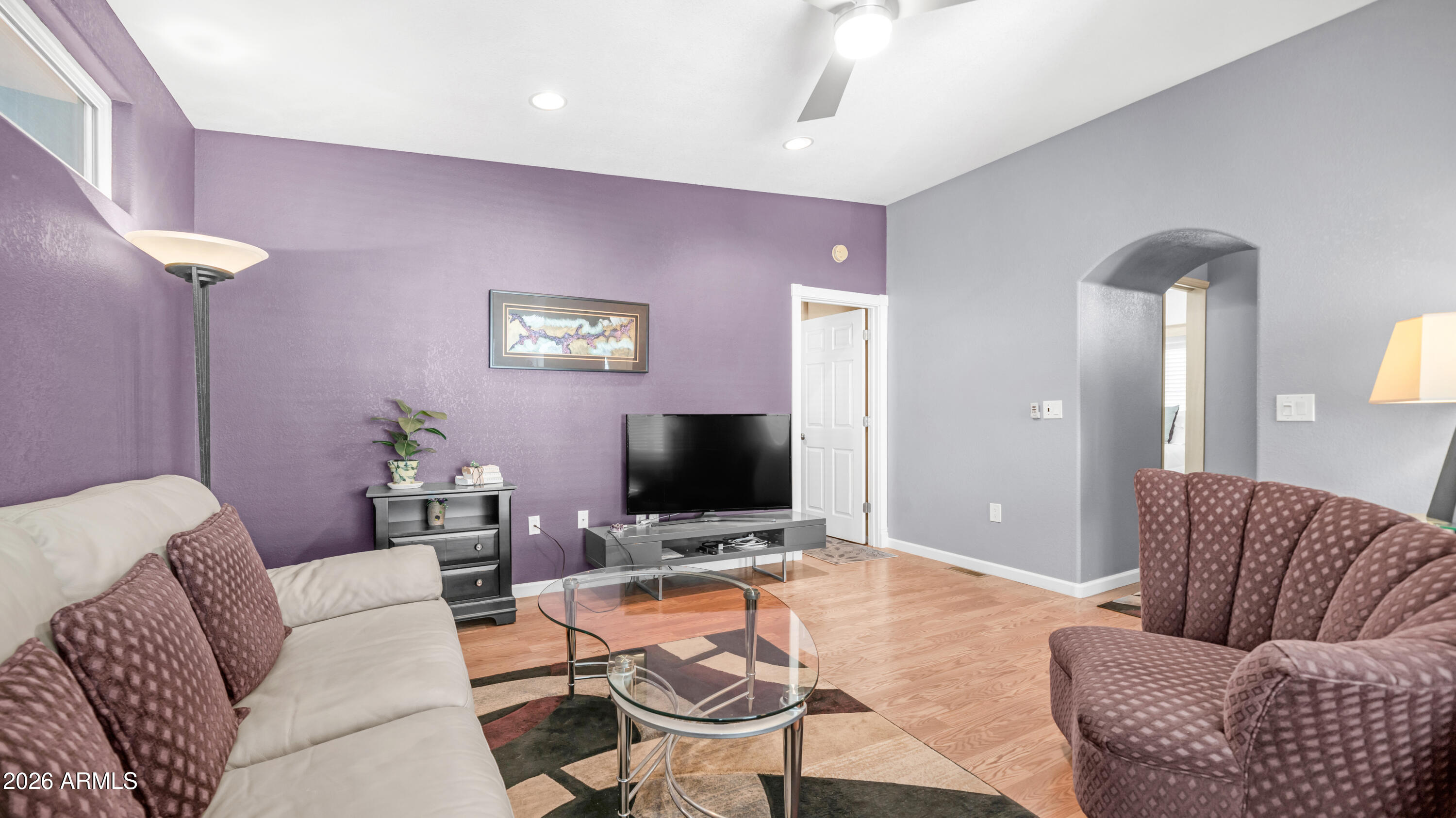 600 South Idaho Road Apache Junction, AZ 85119 - Photo 21 of 63 a living room with furniture and a flat screen tv