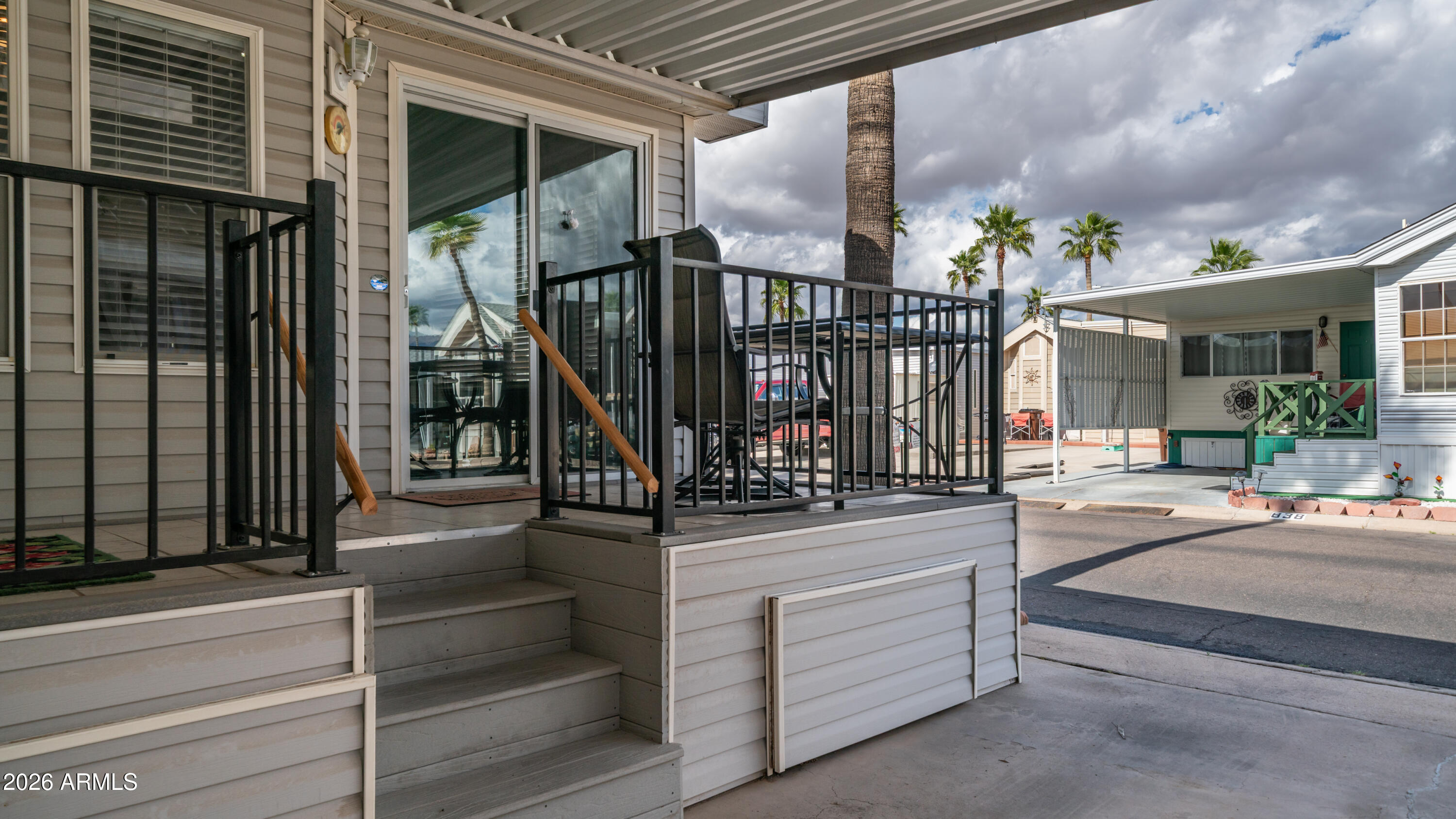 600 South Idaho Road Apache Junction, AZ 85119 - Photo 26 of 63 a view of entryway a hall and front door