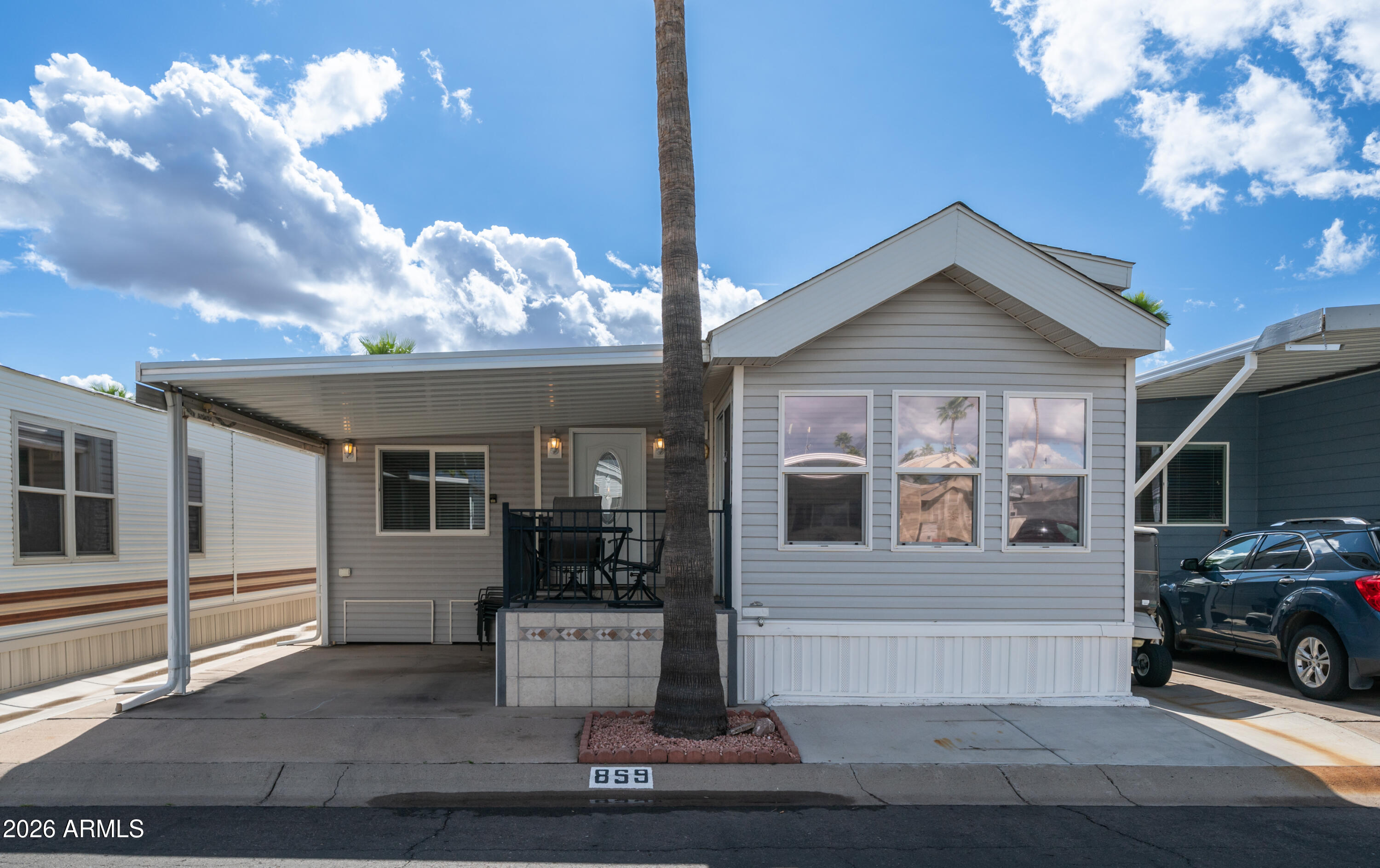 600 South Idaho Road Apache Junction, AZ 85119 - Photo 3 of 63 a view of a house with a garage