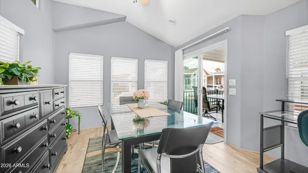a kitchen with stainless steel appliances granite countertop a stove and a refrigerator