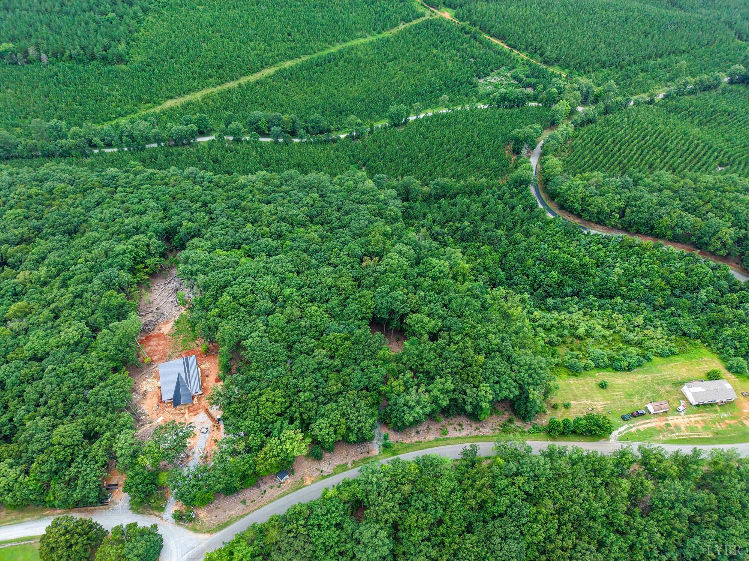 34 Brights Road Pittsville, VA 24139 - Photo 13 of 18 an aerial view of residential houses with outdoor space and trees