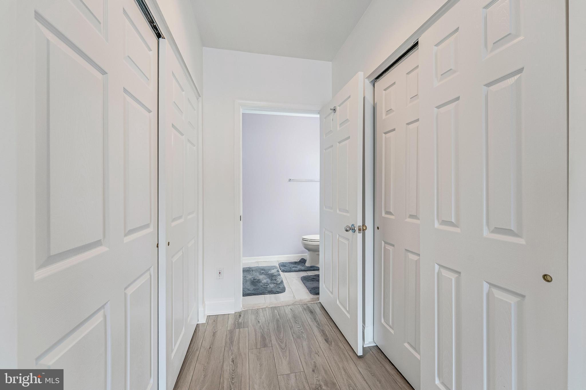 25280 Lake Shore Square, Unit 102 Chantilly, VA 20152 - Photo 26 of 41 a view of a bathroom from the hallway