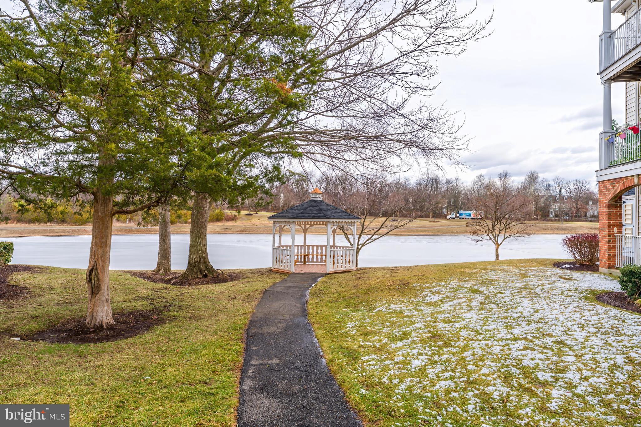 25280 Lake Shore Square, Unit 102 Chantilly, VA 20152 - Photo 38 of 41 a view of a yard with trees