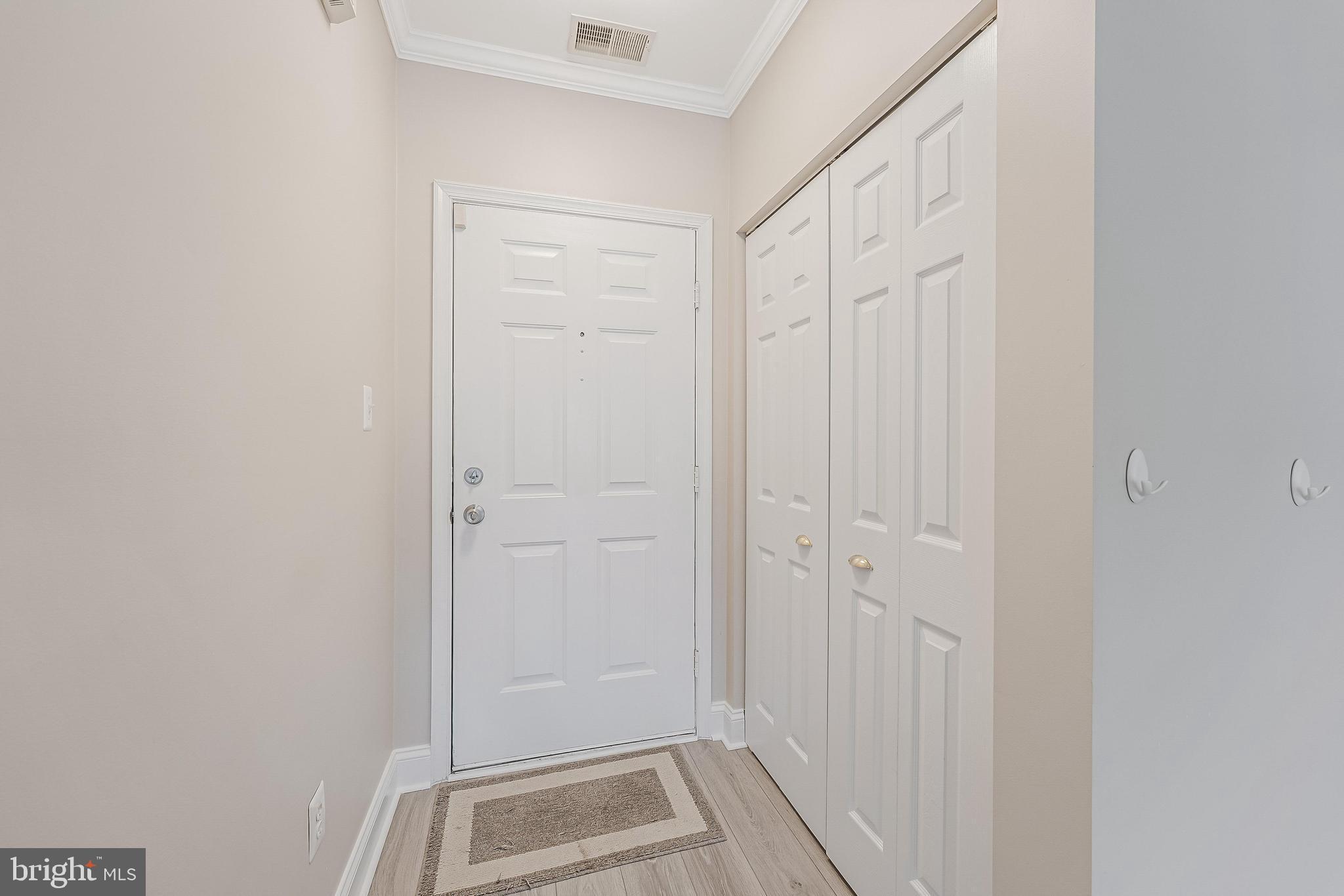 25280 Lake Shore Square, Unit 102 Chantilly, VA 20152 - Photo 4 of 41 a view of front door