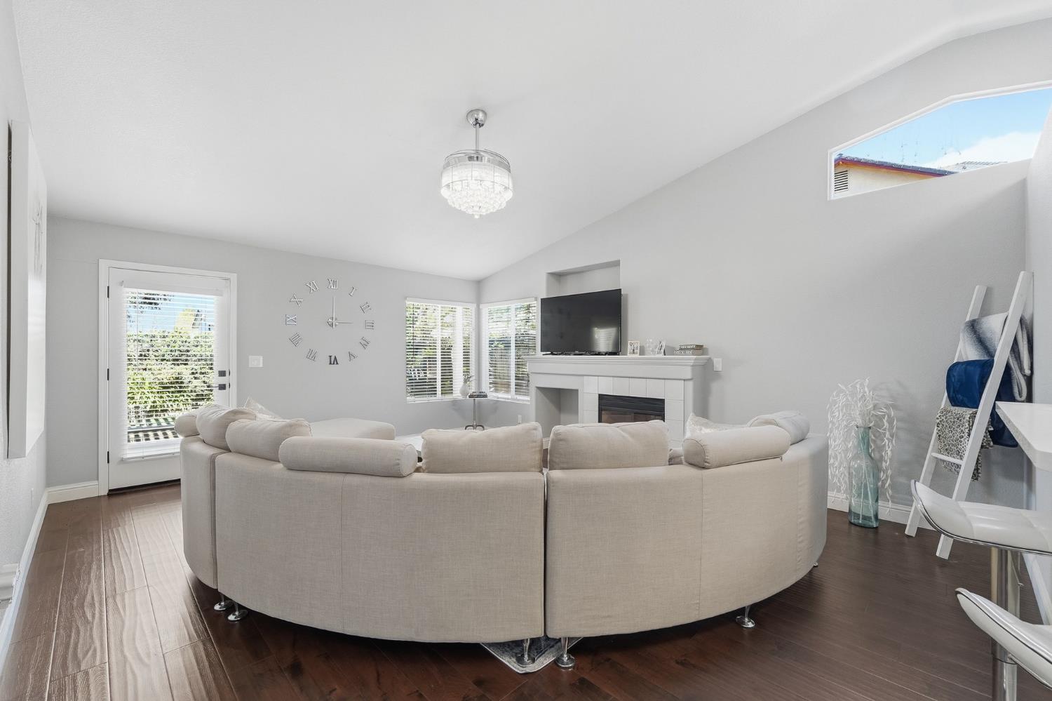 3409 Friar Tuck Way Modesto, CA 95355 - Photo 23 of 46 a living room with furniture and a flat screen tv