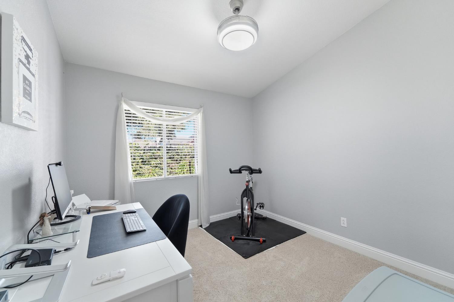 3409 Friar Tuck Way Modesto, CA 95355 - Photo 31 of 46 a view of a workspace with a window