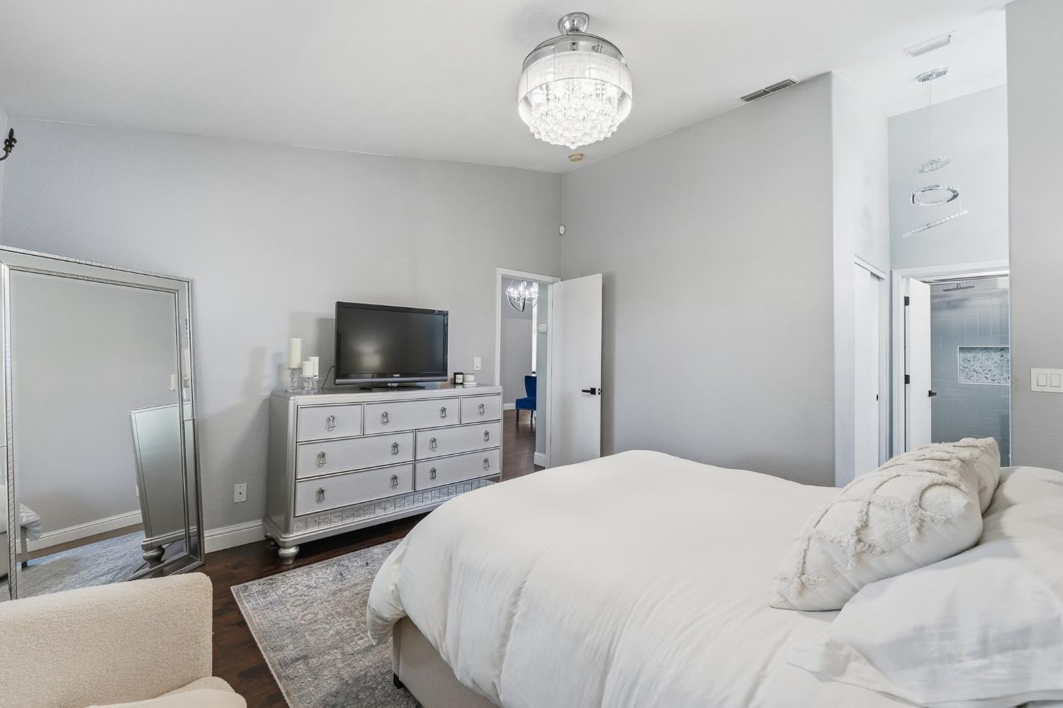 3409 Friar Tuck Way Modesto, CA 95355 - Photo 34 of 46 a bedroom with a bed and flat screen tv