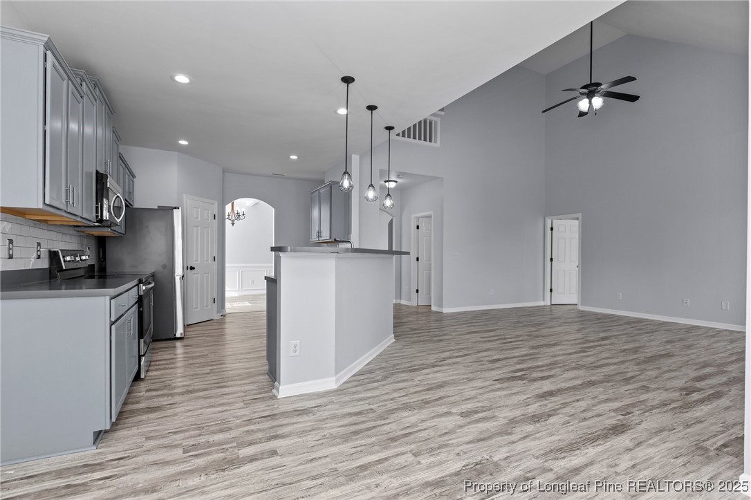 12 Turnbridge Way Spring Lake, NC 28390 - Photo 11 of 46 a view of a kitchen with a sink a refrigerator and a stove