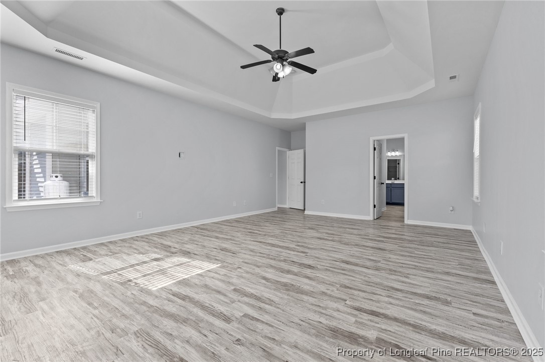 12 Turnbridge Way Spring Lake, NC 28390 - Photo 18 of 46 a view of empty room with wooden floor and ceiling fan