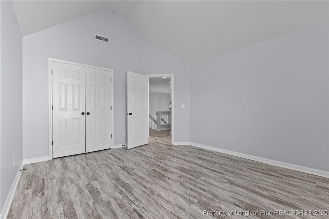 12 Turnbridge Way Spring Lake, NC 28390 - Photo 30 of 46 a view of an empty room with wooden floor