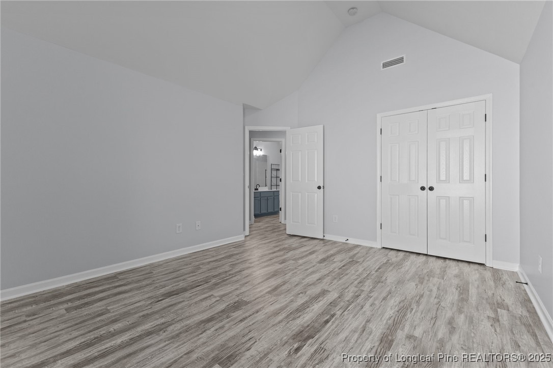 12 Turnbridge Way Spring Lake, NC 28390 - Photo 32 of 46 a view of an empty room with wooden floor