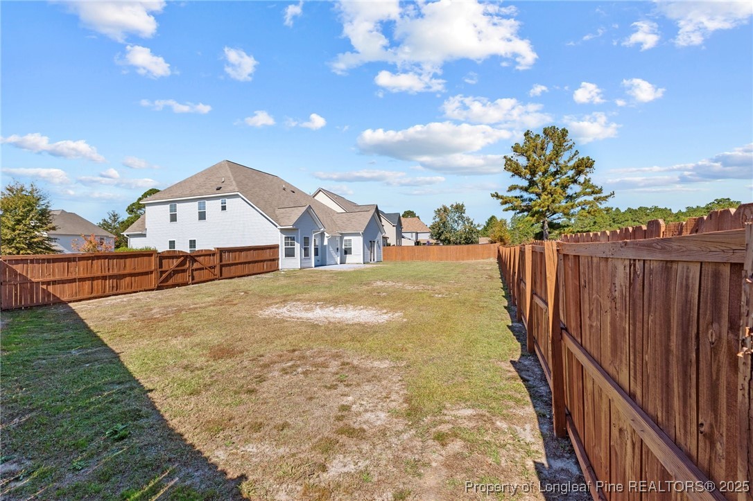 12 Turnbridge Way Spring Lake, NC 28390 - Photo 36 of 46 a view of a house with backyard