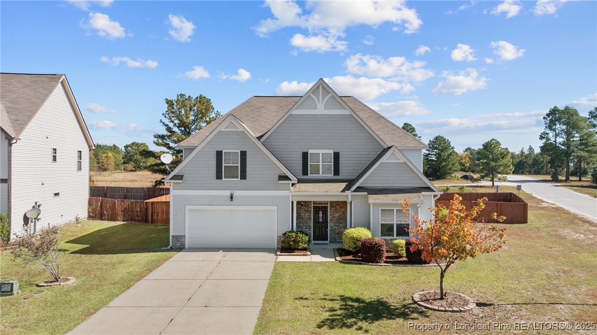 12 Turnbridge Way Spring Lake, NC 28390 - Photo 45 of 46 a front view of a house with a yard