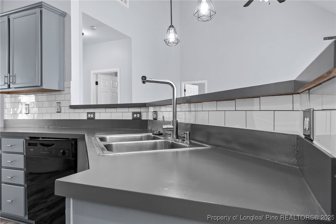 12 Turnbridge Way Spring Lake, NC 28390 - Photo 9 of 46 a kitchen with a sink and cabinets