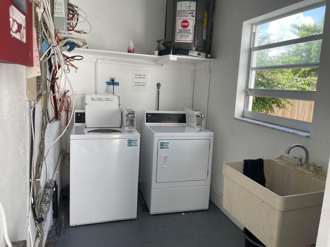 420 West Palm Street, Unit 4 Lantana, FL 33462 - Photo 17 of 21 a utility room with dryer and washer