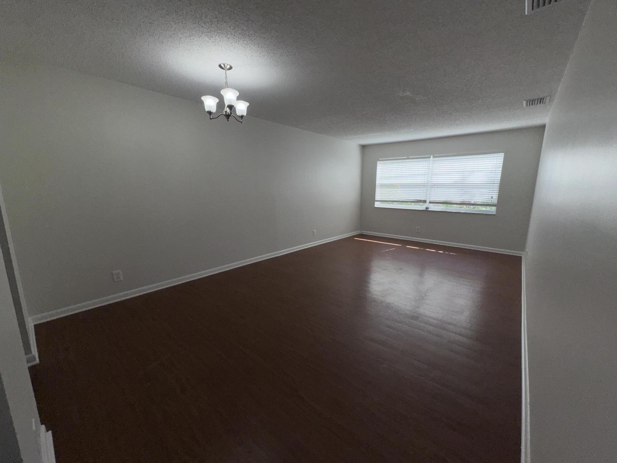 420 West Palm Street, Unit 4 Lantana, FL 33462 - Photo 7 of 21 a view of an empty room with a window